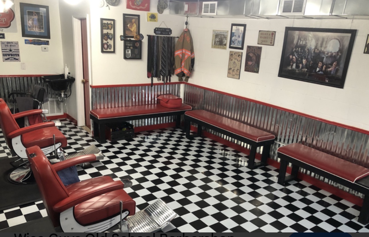 Wise Guys interior with checkered floor and red leather chairs